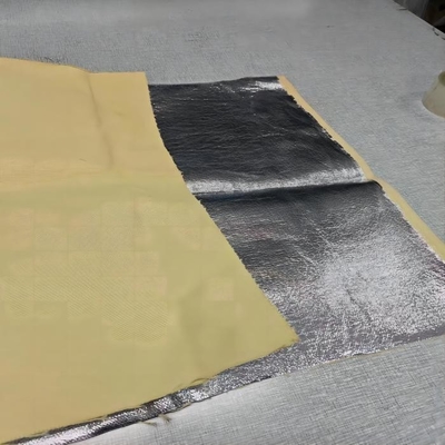 Kain Para Aramid Konduktivitas Termal Rendah Dengan Lapisan Aluminium