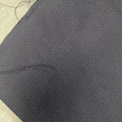NE32S2 Kain Serat Aramid Putih Ketebalan 0.2Mm Kain Kekuatan Tinggi Cocok untuk Tekstil Penguat dan Pelindung