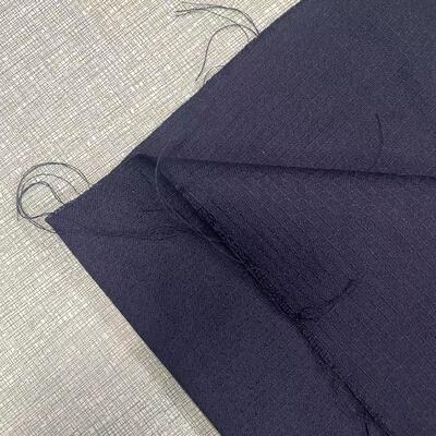 NE32S2 Kain Serat Aramid Putih Ketebalan 0.2Mm Kain Kekuatan Tinggi Cocok untuk Tekstil Penguat dan Pelindung